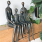 Sitting family of 4 shelf sculpture