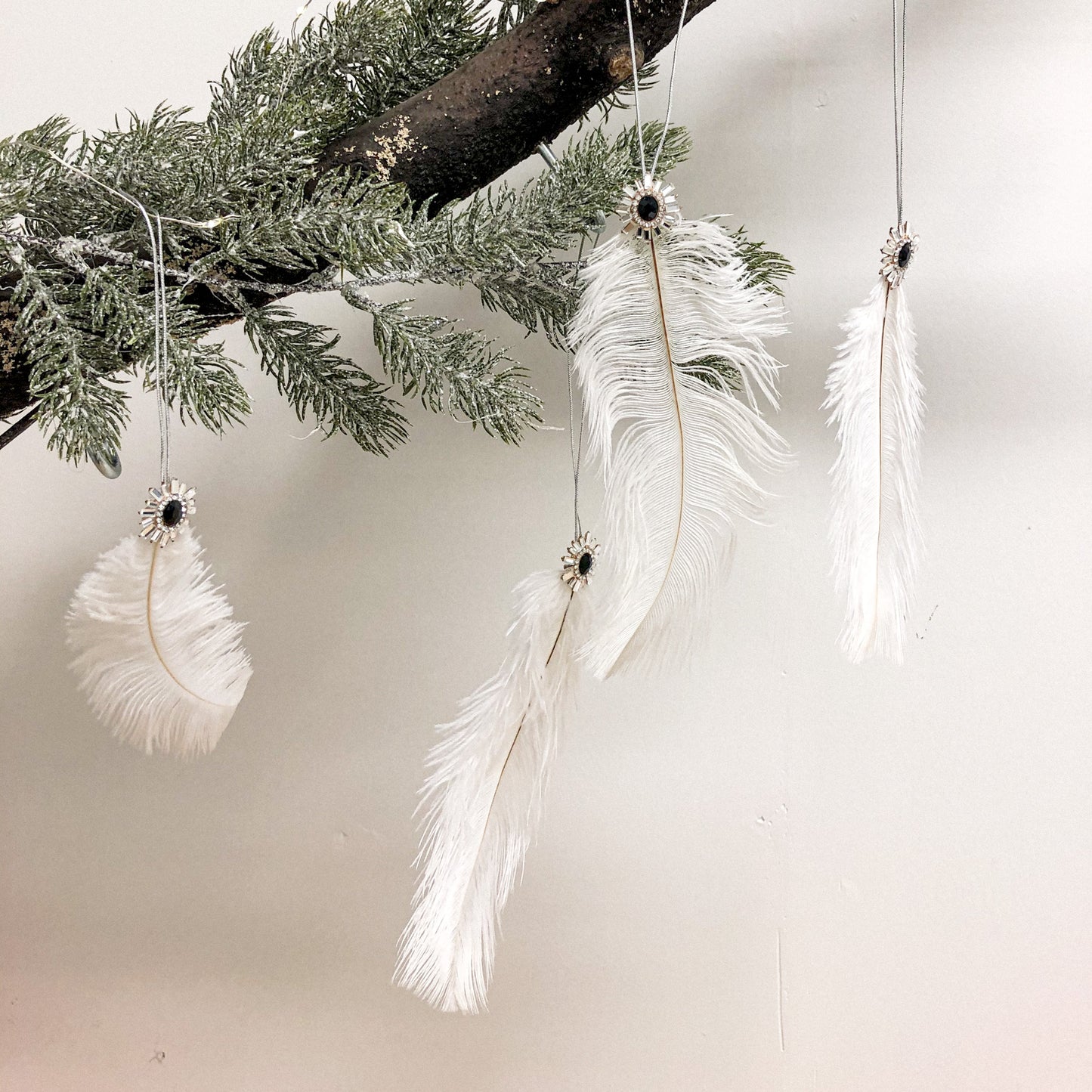 Hanging White Feather With Black Gem (Set of 4)